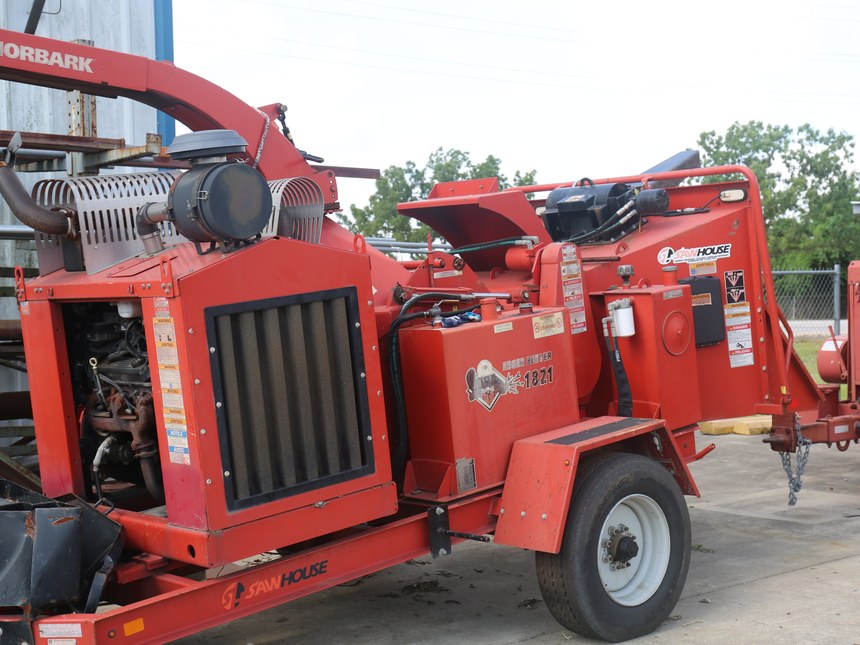 Morbark Eeger Beever 1821 brush chipper on its trailer in the yard at Channelview